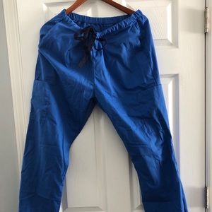 4 Piece Scrubs Bottoms. NeverWorn Blue,Pink,Purple